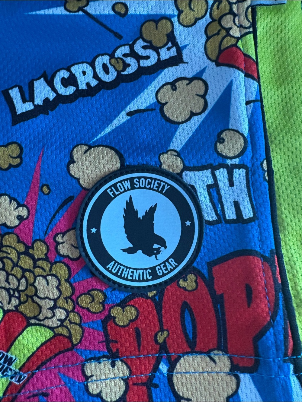 Society Blue Pop Art Lacrosse Kids Athletic Shorts with Neon Green Panel